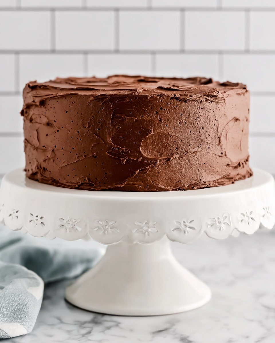 Moist and Delicious Layered Chocolate Cake with Rich Frosting